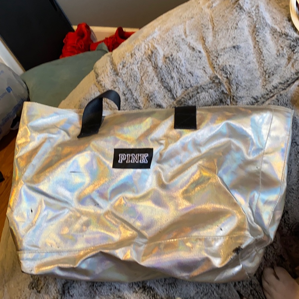 Pink Victoria’s Secret bag. See pictures